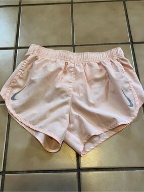 Nike Light Pink Women's Athletic Running Shorts with Grey Swoosh